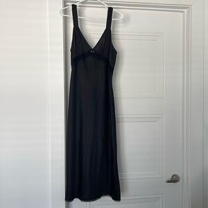 Aritzia purchased “Wilfred” black slip dress.